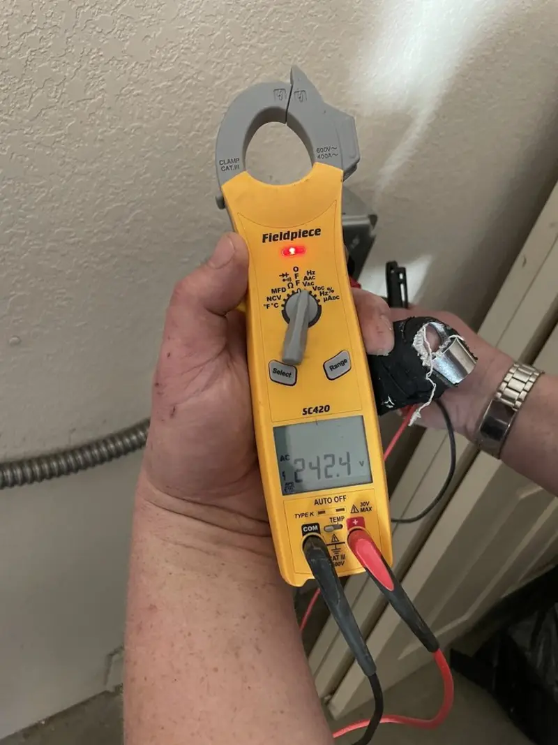 Voltage testing with clamp meter during Generator Installation in Salida
